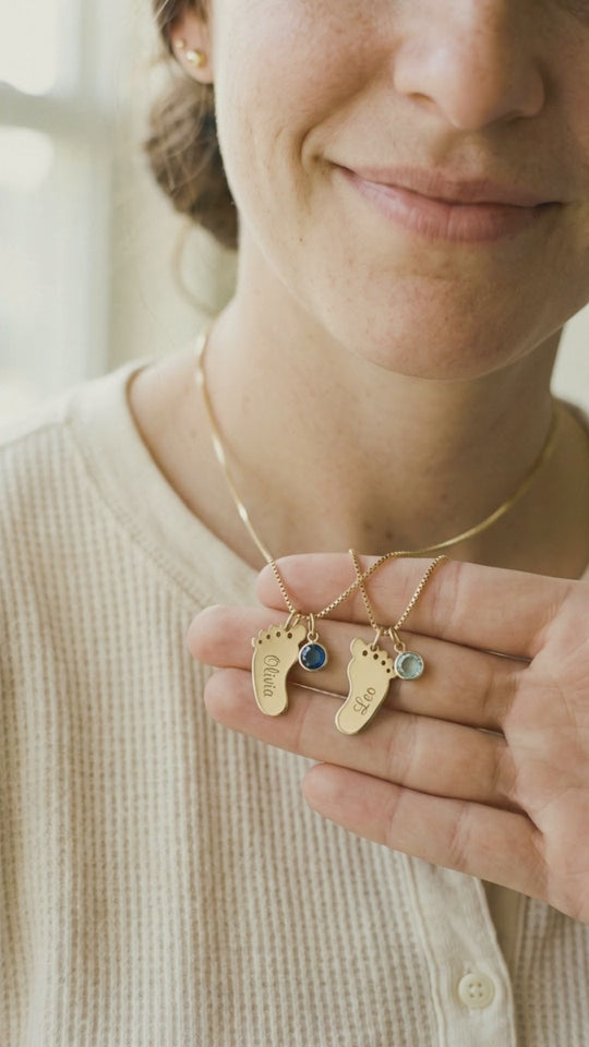 Video: the baby-feet charms and their stones catching the light