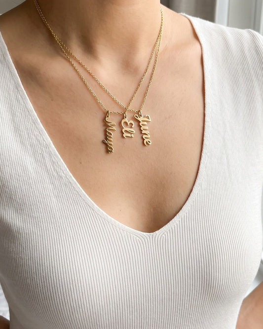 Mom necklace with kids' names, worn