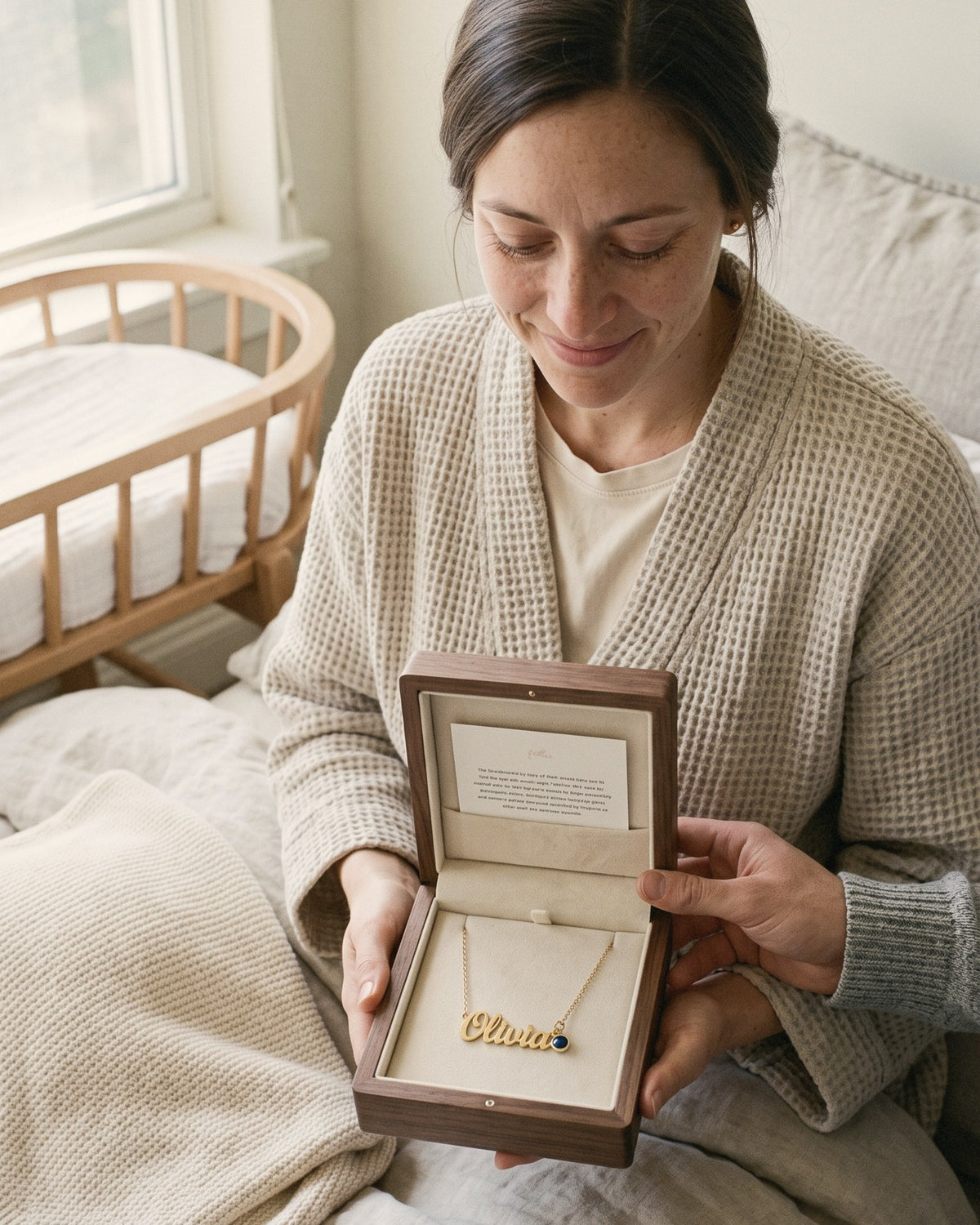 A new mom opening the push present box her partner gives her